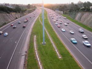 Cars on a highway at dusk