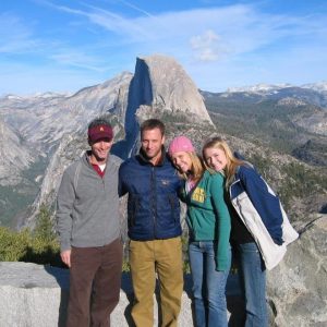 Researcher Dave White and students smiling at Yosemite National Park