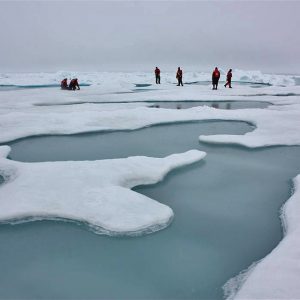 Researchers walk on melting ice